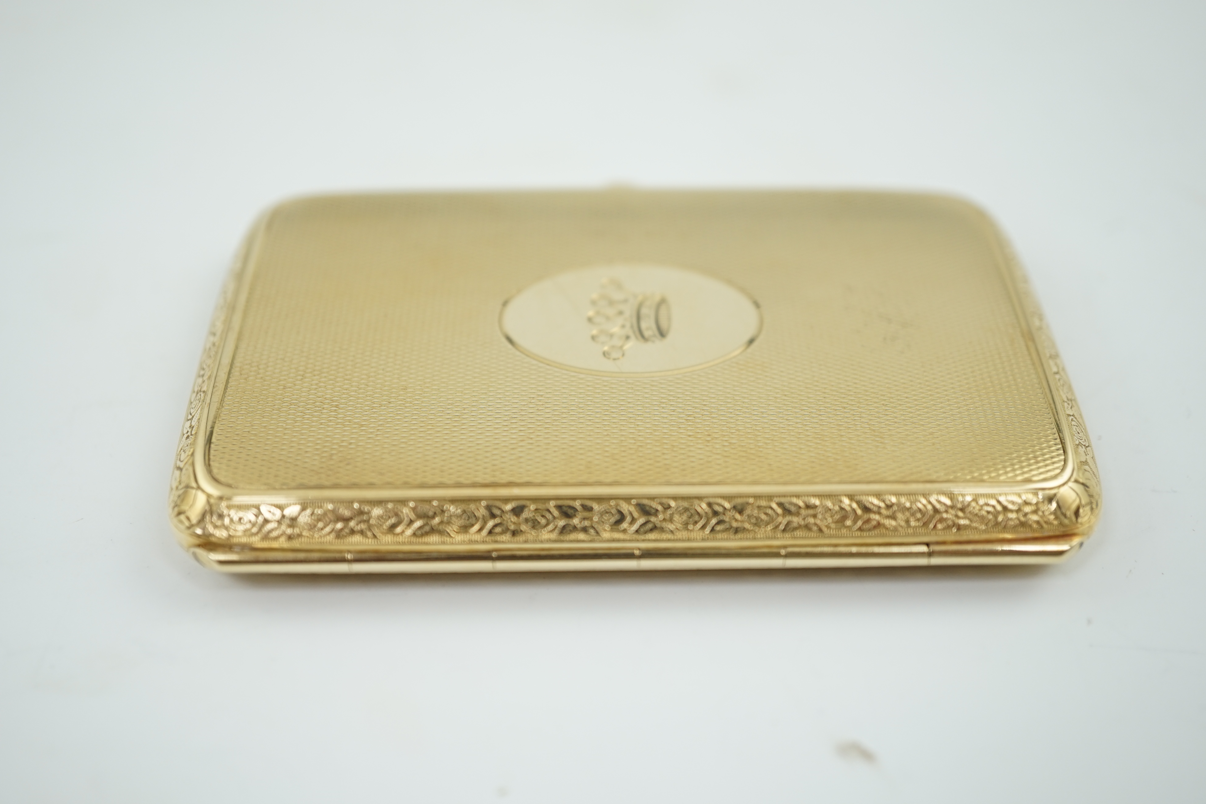 A 20th century engine turned 14k gold cigarette case